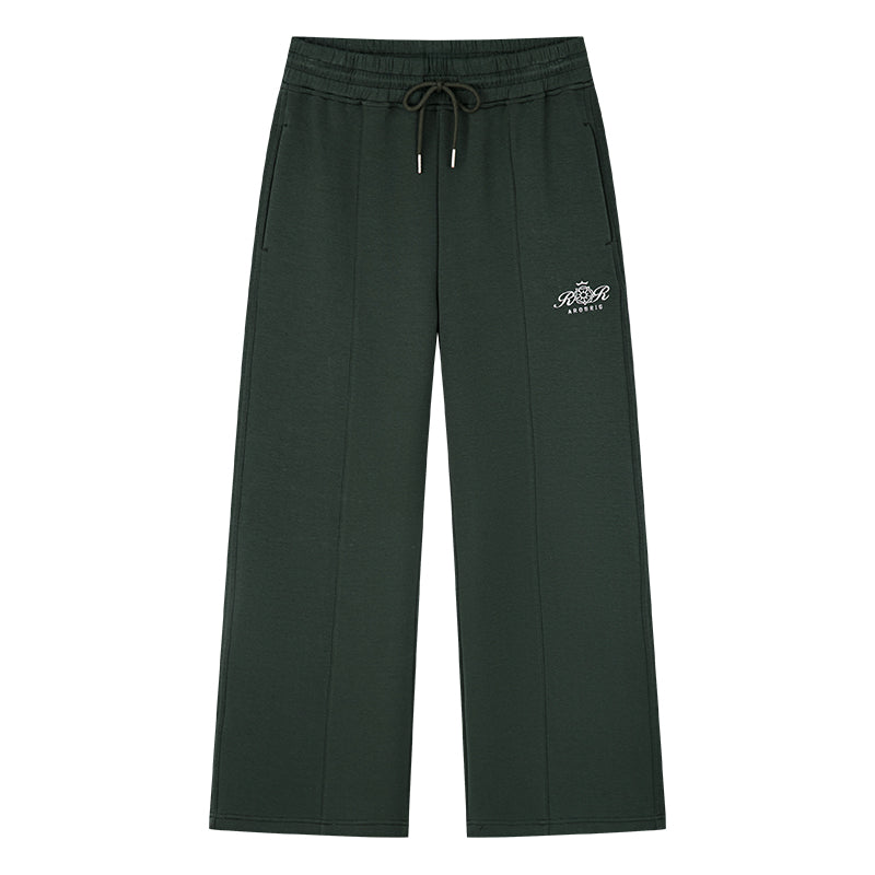 AROSRIS City Concerto Straight Leg Pants dark green — side profile showing fluid drape and leg-lengthening effect