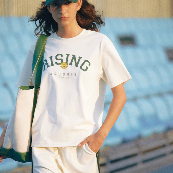 AROSRIS Retro Cotton Sweat Shorts in Cream Beige — full body street style showing relaxed fit styled with white graphic tee
