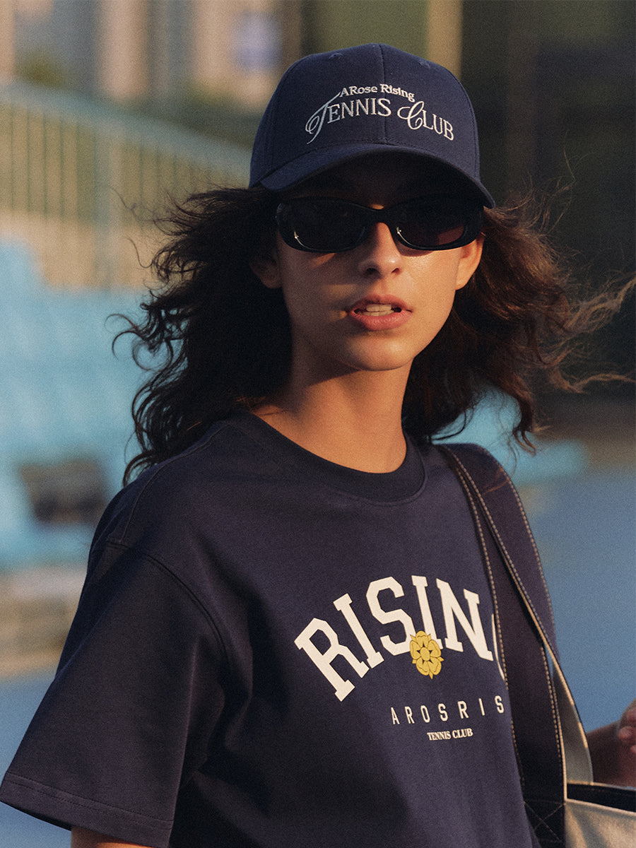 AROSRIS Vintage Dad Hat in Classic Navy — full body lifestyle shot showing structured cotton twill and adjustable back strap