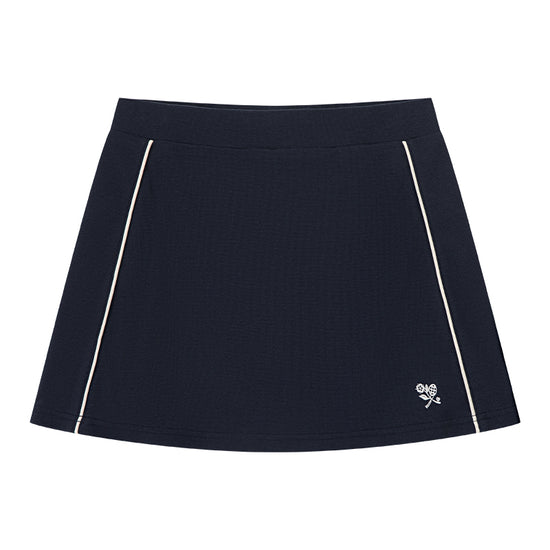 AROSRIS Tennis Club Retro Waffle Skort in Classic Navy — flat lay showing structured knit fabric and built-in shorts