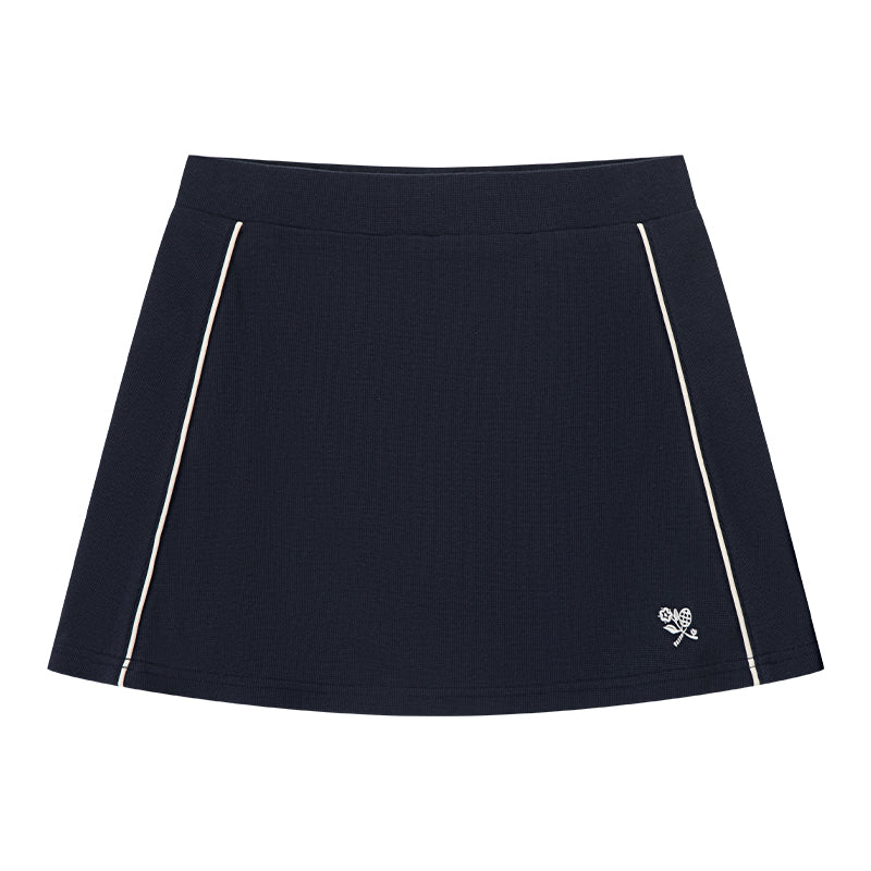 AROSRIS Tennis Club Retro Waffle Skort in Classic Navy — flat lay showing structured knit fabric and built-in shorts