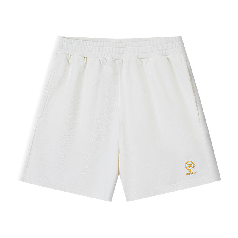 AROSRIS City Stroll Cotton Shorts in white — flat lay showing 3D waffle texture and racket embroidery hem detail