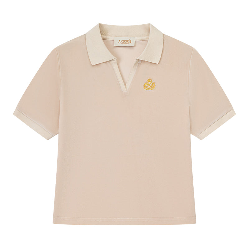 AROSRIS Holiday Velvet Badge Polo in cream — flat lay showing soft velour texture and badge logo embroidery chest detail