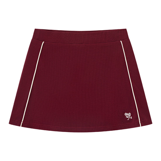 AROSRIS Tennis Club Waffle Knit Skort in Passion Red — flat lay showing 3D waffle texture and A-line cut