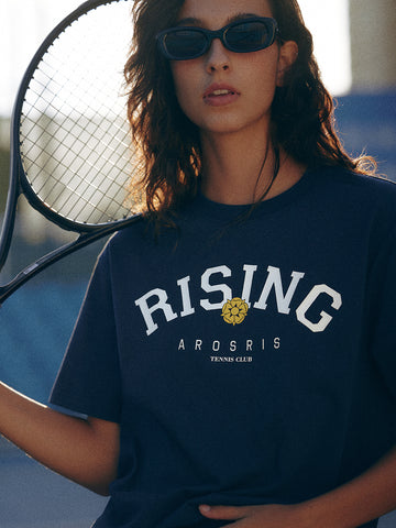 AROSRIS Retro Rising Tennis Club Graphic Tee in Classic Navy — close-up showing bold varsity collegiate print and long-staple cotton texture