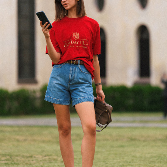AROSRIS Princess A-Line Denim Shorts in Vintage Washed Blue — front view showing rigid denim structure and leg-lengthening trapezoid cut