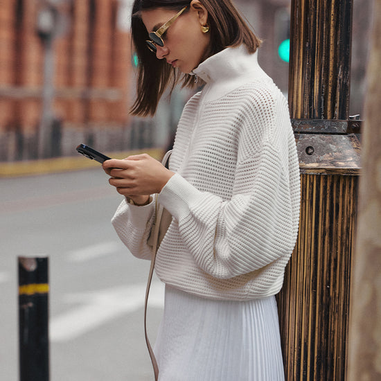 AROSRIS Old Money Hollow-Out Knit — side profile showing openwork cable texture and YKK half-zip hardware detail
