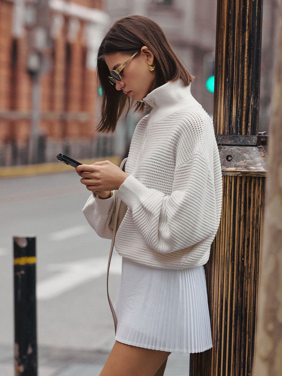 AROSRIS Old Money Hollow-Out Knit — side profile showing openwork cable texture and YKK half-zip hardware detail