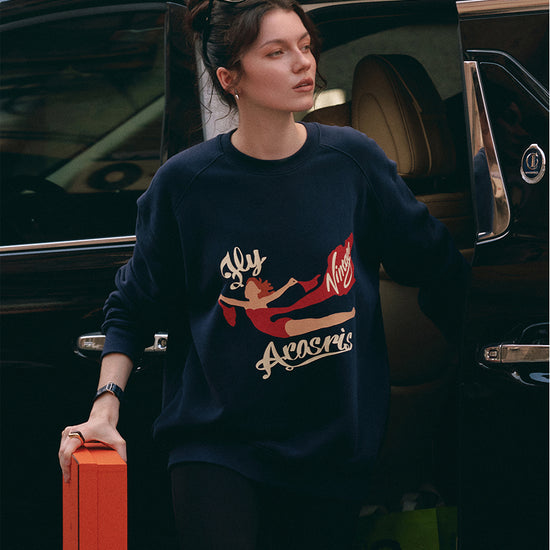 AROSRIS The Princess Retro Crewneck in Royal Navy — styled with biker shorts showing 90s off-duty aesthetic