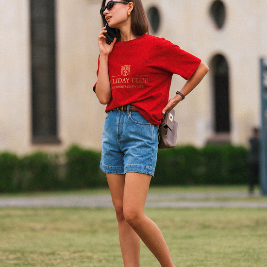 AROSRIS Princess Vintage Denim Shorts — side profile showing A-line flare, cuffed hem and natural high-waist rise
