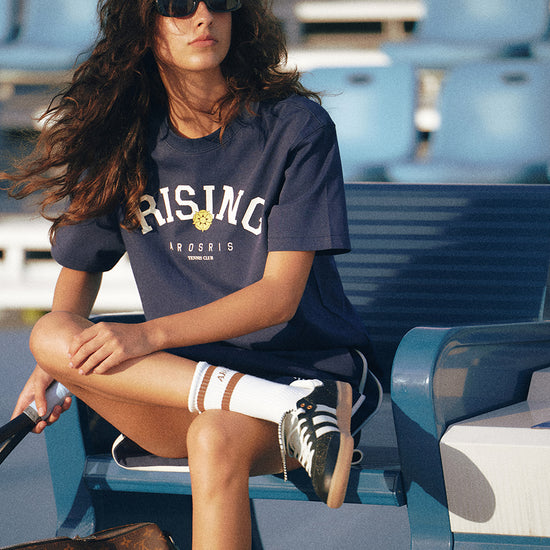 AROSRIS Rising Graphic Tee in Classic Navy — full body street style showing relaxed fit and retro sport aesthetic