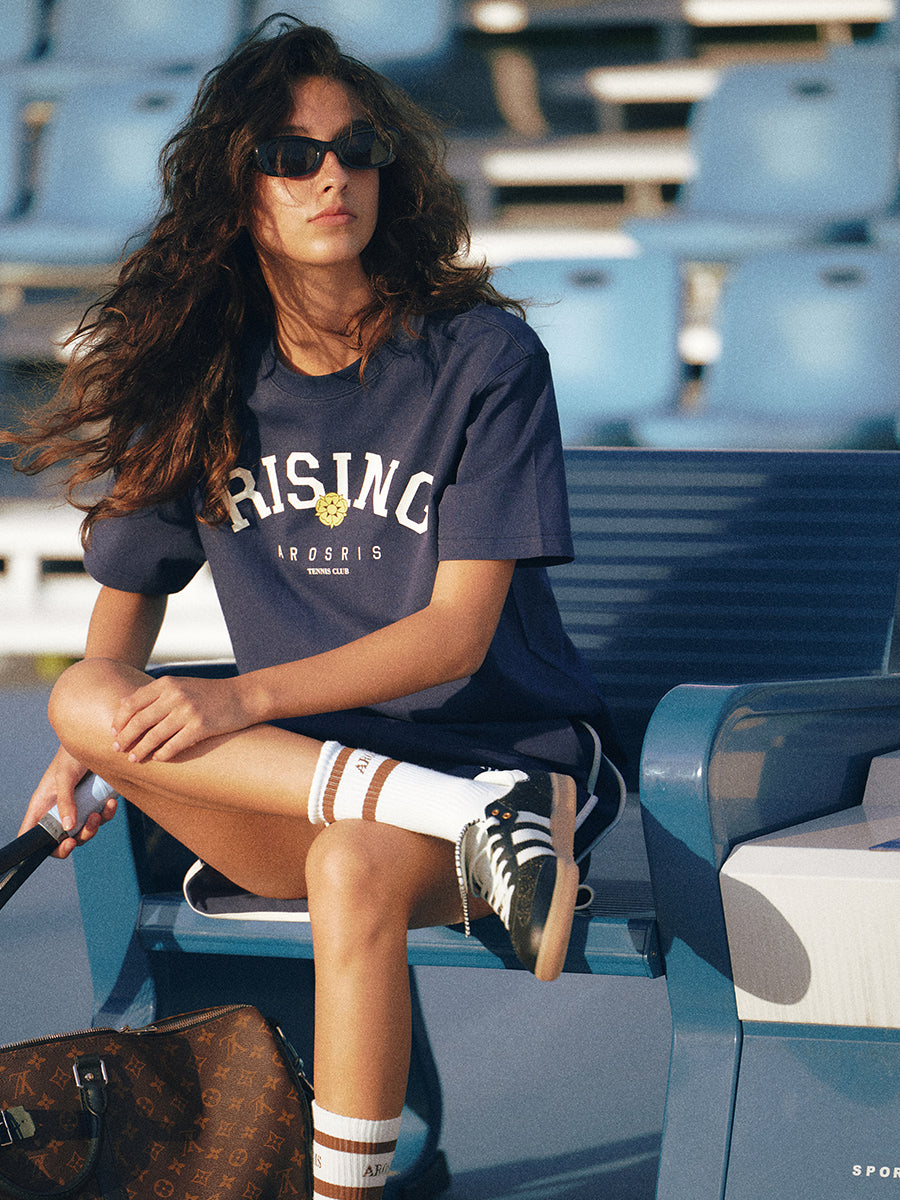 AROSRIS Rising Graphic Tee in Classic Navy — full body street style showing relaxed fit and retro sport aesthetic