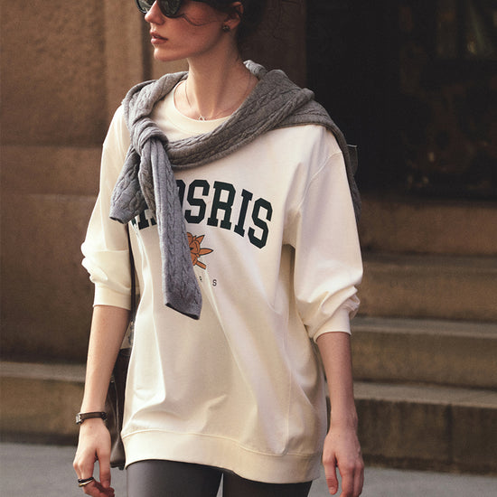 AROSRIS The Princess Retro Pullover in Vintage White — full body showing crewneck silhouette styled with biker shorts