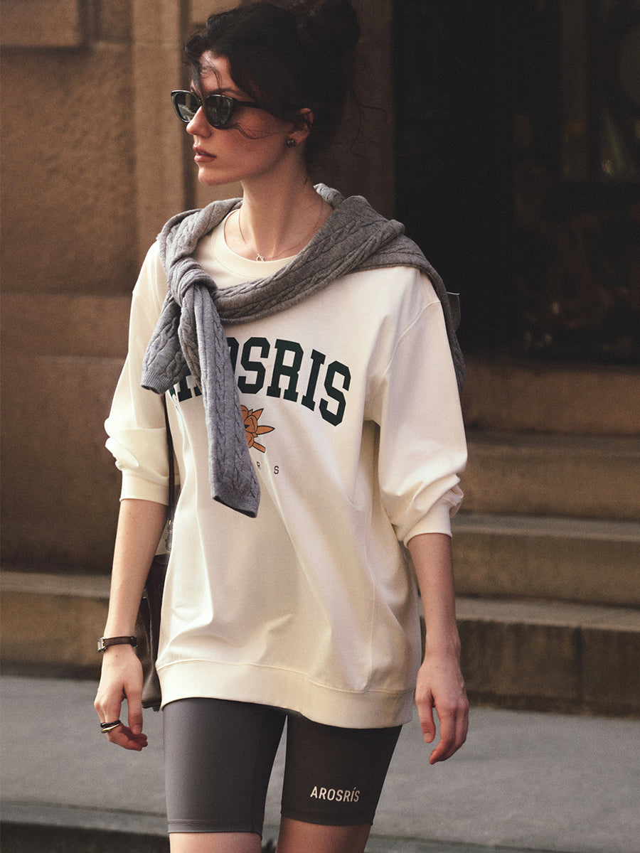 AROSRIS The Princess Retro Pullover in Vintage White — full body showing crewneck silhouette styled with biker shorts
