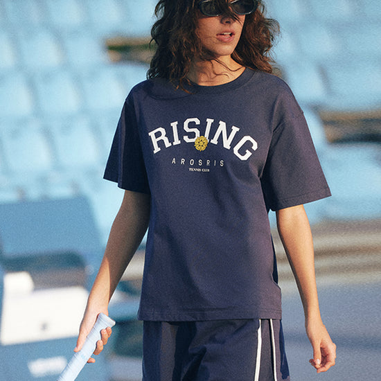 AROSRIS Retro Logo Sweat Shorts in Classic Navy — outdoor lifestyle shot showing vintage athletic silhouette and elastic waistband