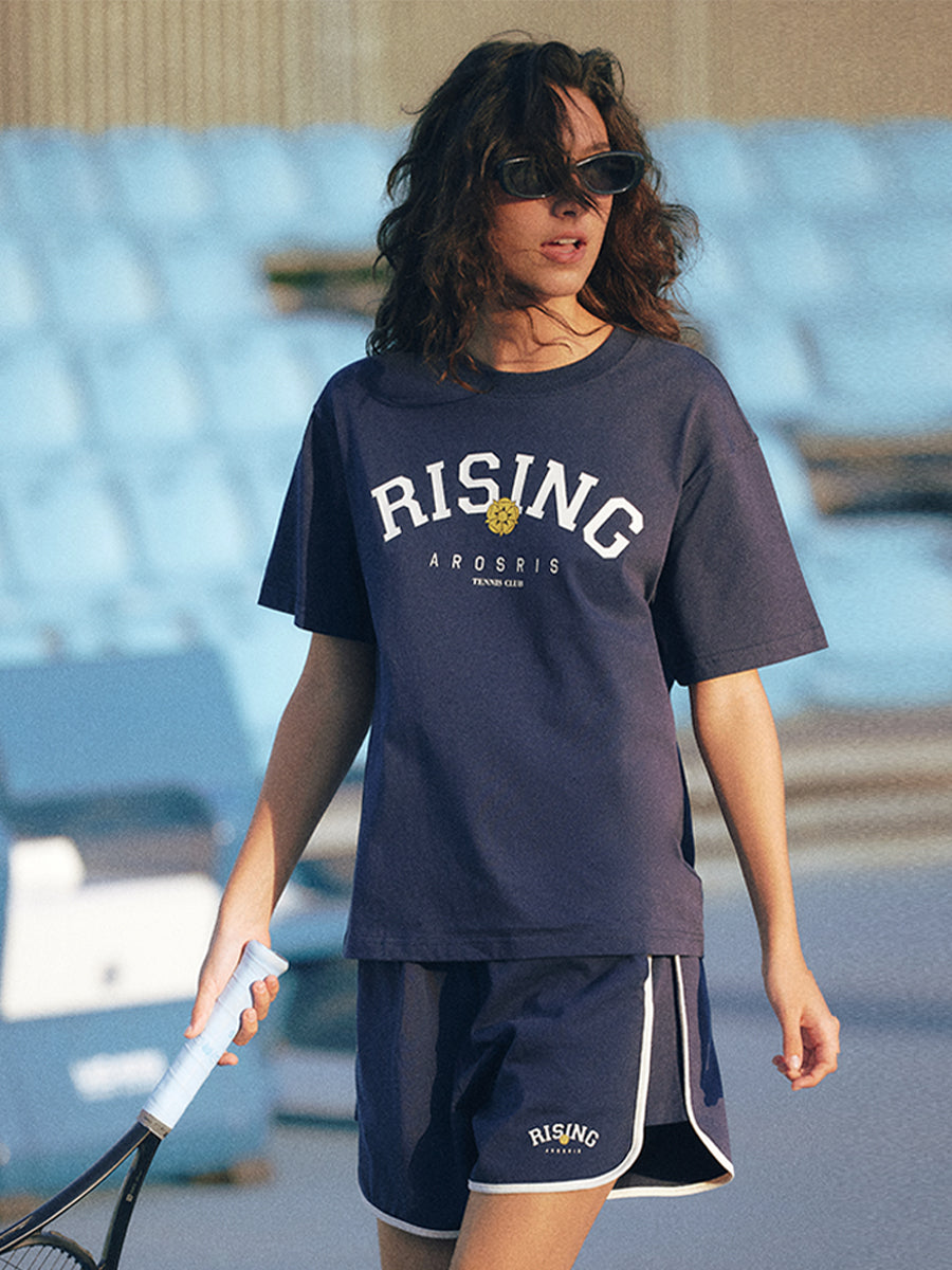 AROSRIS Retro Logo Sweat Shorts in Classic Navy — outdoor lifestyle shot showing vintage athletic silhouette and elastic waistband