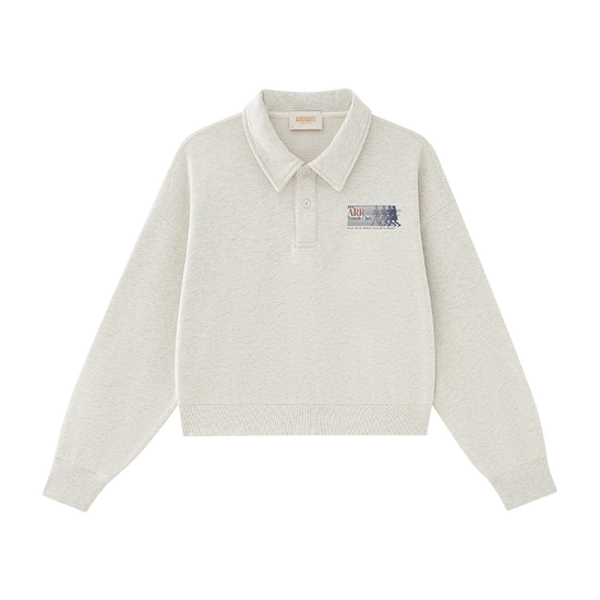 AROSRIS Tennis Club Retro Cotton Polo Sweatshirt in Oatmeal Heather — flat lay showing vintage collegiate chest graphic and polo collar design