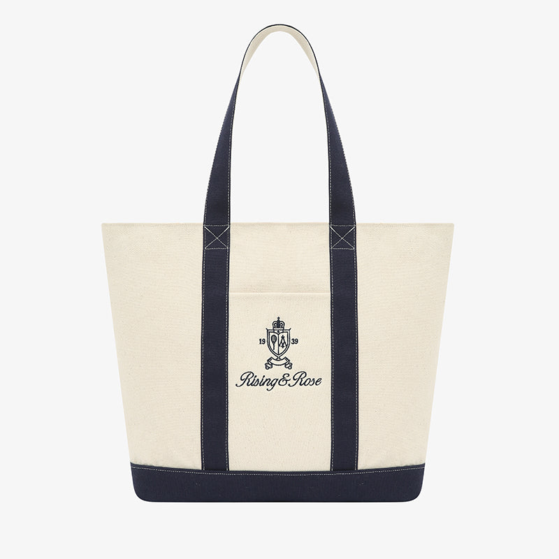 AROSRIS Heritage Canvas Tote — side flat lay showing PVC-reinforced structured base and oversized 21.5L silhouette