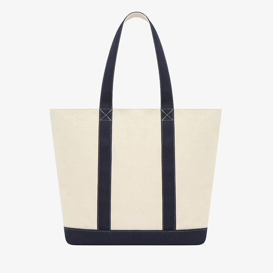 AROSRIS Heritage Tote embroidery close-up — showing collegiate heritage logo detail on natural canvas fabric