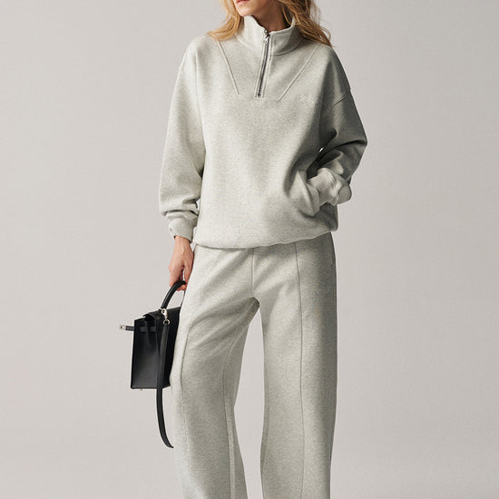 AROSRIS City Concerto Pants light grey — side view showing straight leg silhouette and pintuck seam detail