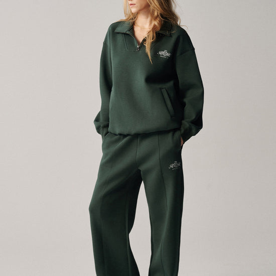 AROSRIS City Concerto Scuba Knit Pants in dark green — front view showing structured straight leg cut