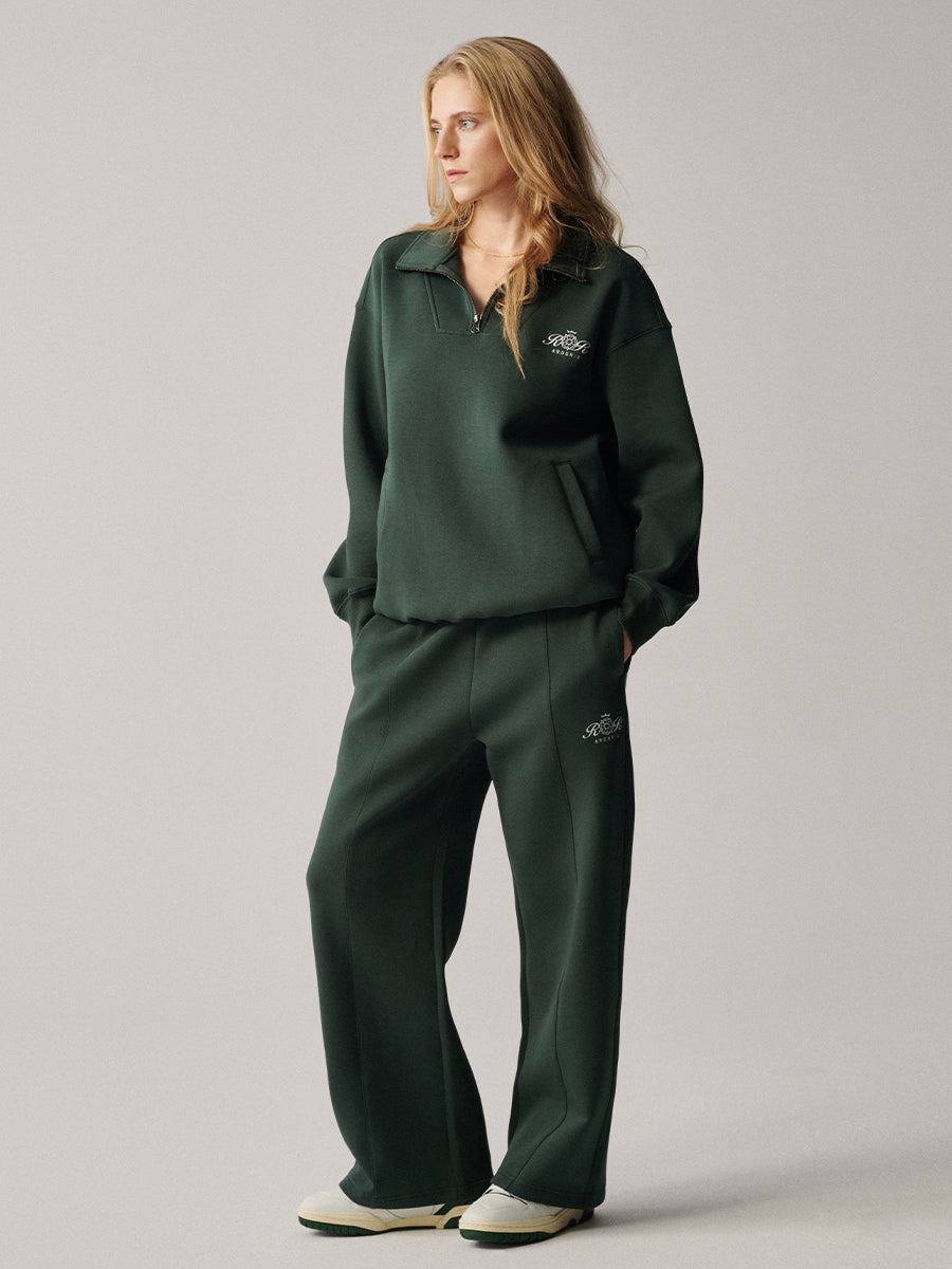 AROSRIS City Concerto Scuba Knit Pants in dark green — front view showing structured straight leg cut