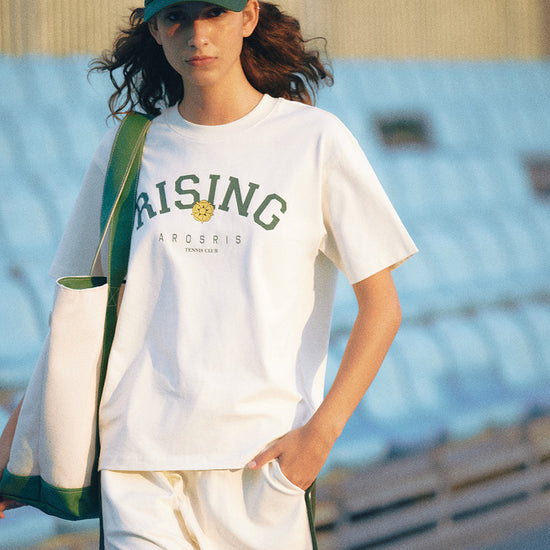 AROSRIS Vintage Dad Hat in Varsity Green — styled with white tee and jeans showing effortless off-duty aesthetic