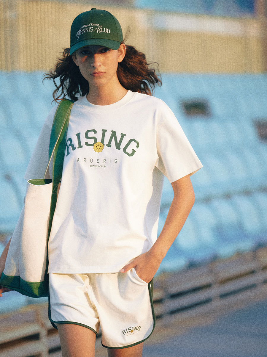 AROSRIS Vintage Dad Hat in Varsity Green — styled with white tee and jeans showing effortless off-duty aesthetic