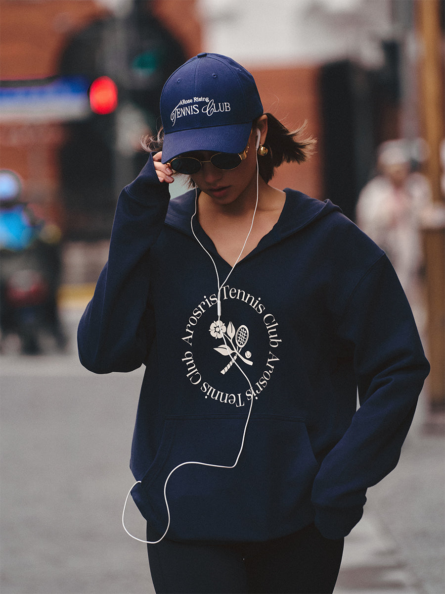 AROSRIS Tennis Club V-Neck Hoodie in Misty Navy — outdoor shot showing double-sided knit texture and hip-covering length