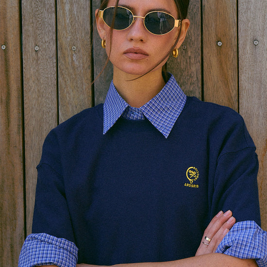 AROSRIS City Stroll Tee styled on model with sunglasses — showing classic straight fit and waffle texture