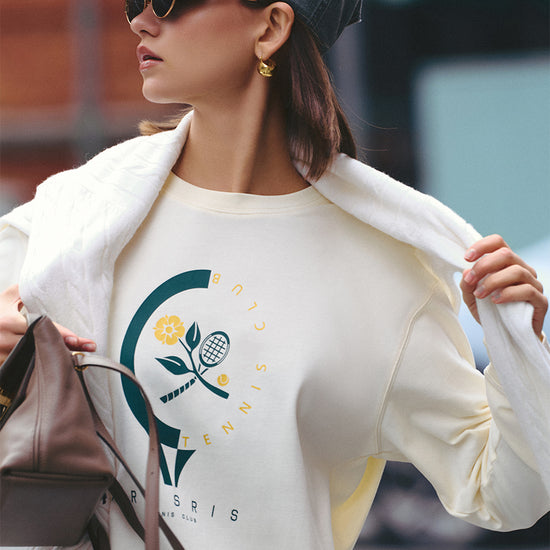 AROSRIS Pima Cotton Long Sleeve Tee in Vintage Apricot — side profile showing relaxed figure-flattering drape