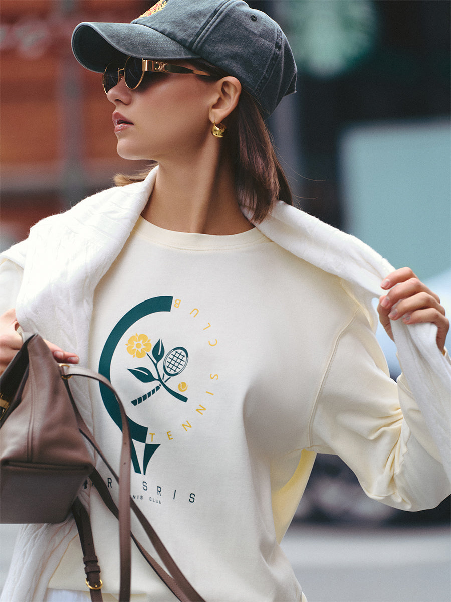 AROSRIS Pima Cotton Long Sleeve Tee in Vintage Apricot — side profile showing relaxed figure-flattering drape