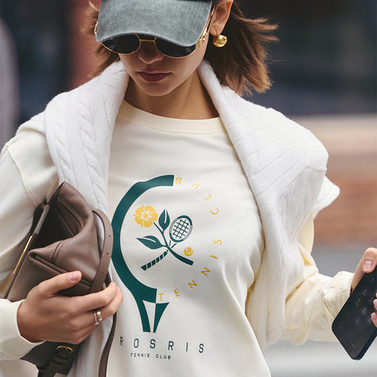 Close-up of AROSRIS Tennis Club Pima Cotton Long Sleeve Tee — retro tennis racket graphic and soft natural fabric texture