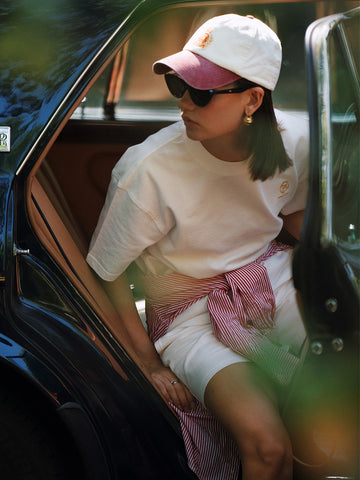 AROSRIS City Stroll Waffle Texture Cotton Tee in white — model wearing with pink shorts and cap, street style