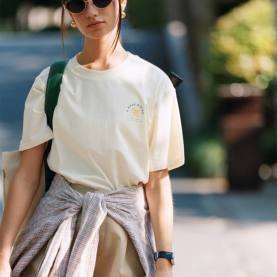 AROSRIS Tennis Friendship Tee in white — front view showing relaxed silhouette and vintage graphic print