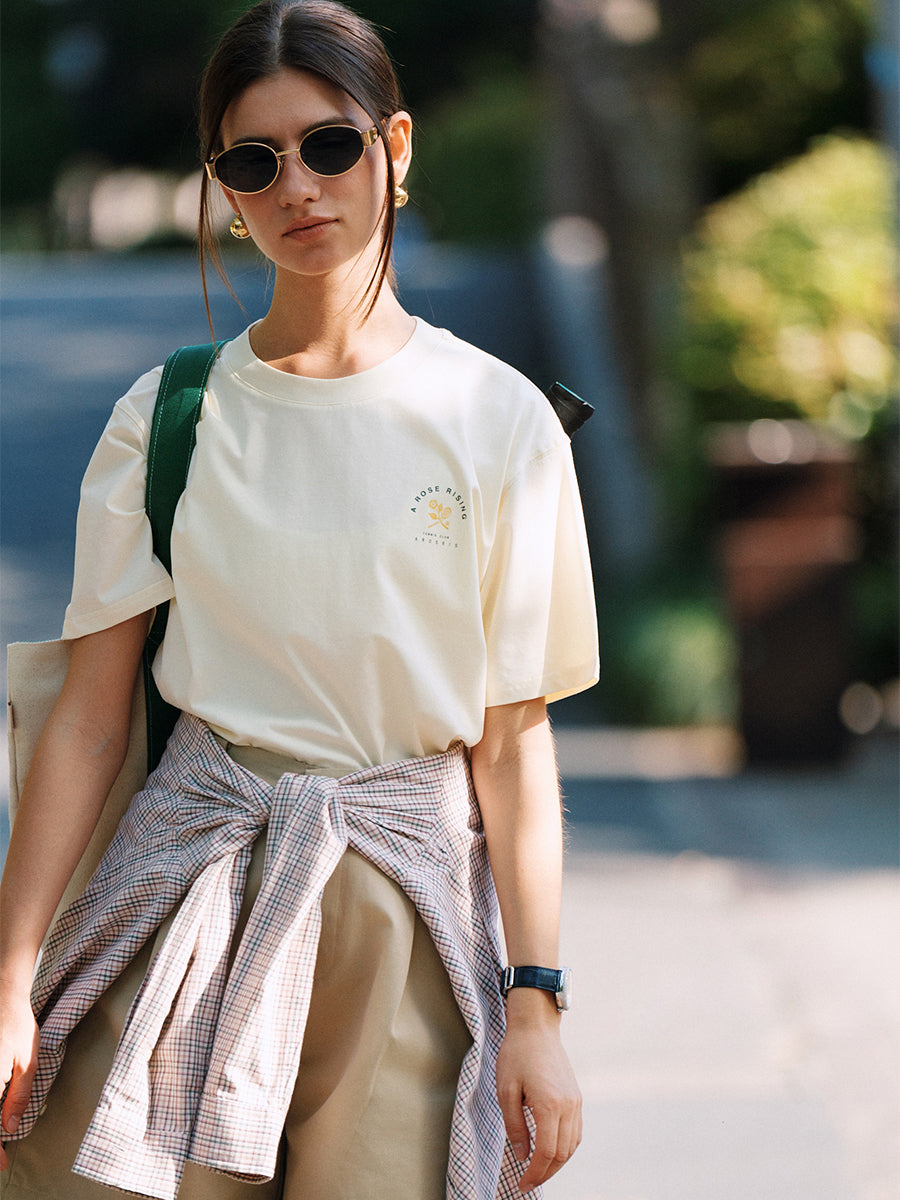 AROSRIS Tennis Friendship Tee in white — front view showing relaxed silhouette and vintage graphic print