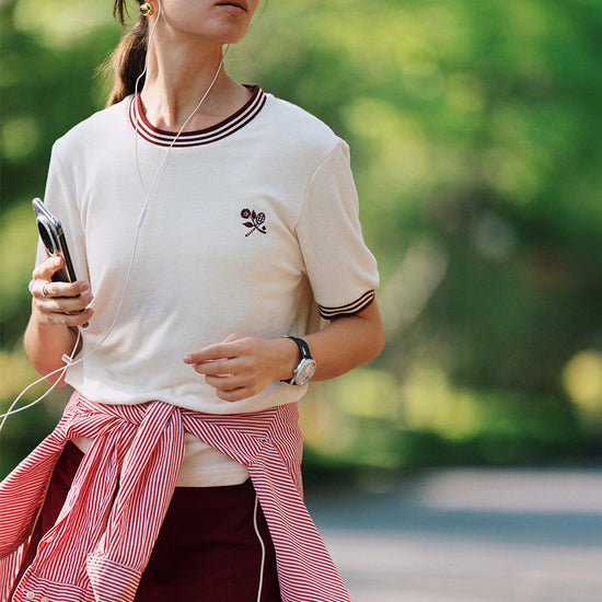 AROSRIS Tennis Club Skort in Passion Red — styled with matching waffle knit contrast polo for a coordinated tennis set