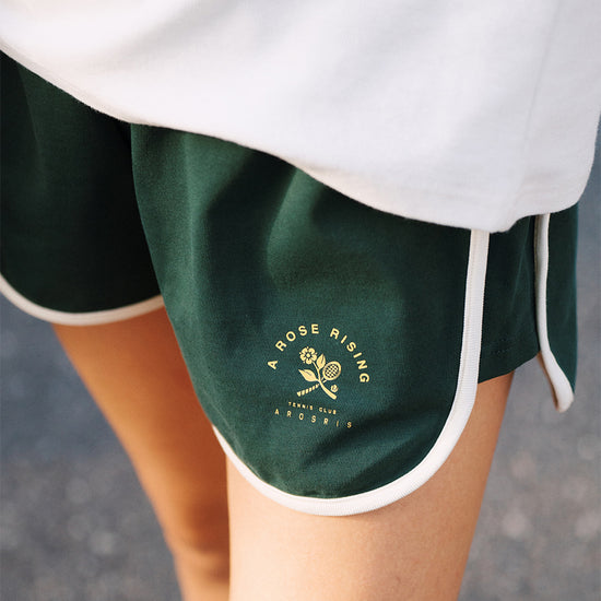 AROSRIS Avenue Retro Cotton A-Line Shorts in forest green — close-up showing wide leg opening and A-line silhouette