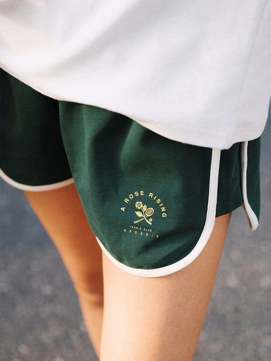 AROSRIS Avenue Retro Cotton A-Line Shorts in forest green — close-up showing wide leg opening and A-line silhouette
