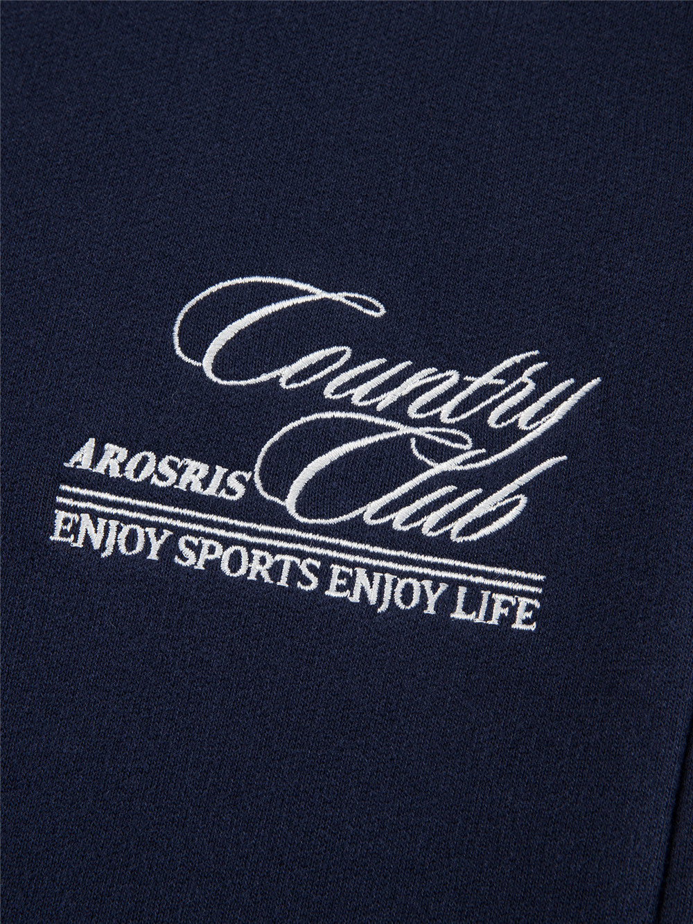 Arosris navy country club relaxed sweatpants showcasing a comfortable elastic waistband, relaxed fit with cuffed hems, and custom vintage script embroidery.