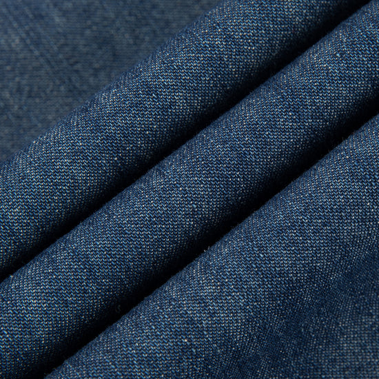 Arosris washed blue offshore crest denim shirt showcasing a classic fit, premium vintage wash, and signature nautical anchor chest pocket embroidery.