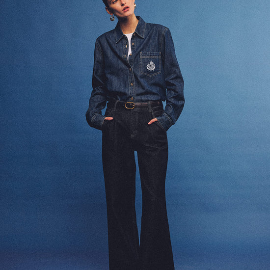 Arosris washed blue offshore crest denim shirt with nautical embroidery, styled as a cohesive 90s vintage double-denim outfit.