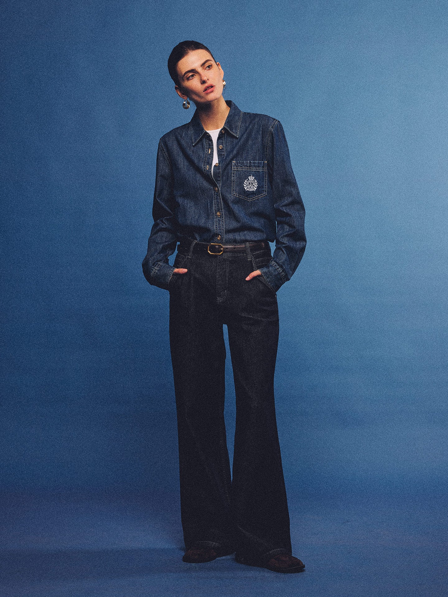 Arosris washed blue offshore crest denim shirt with nautical embroidery, styled as a cohesive 90s vintage double-denim outfit.