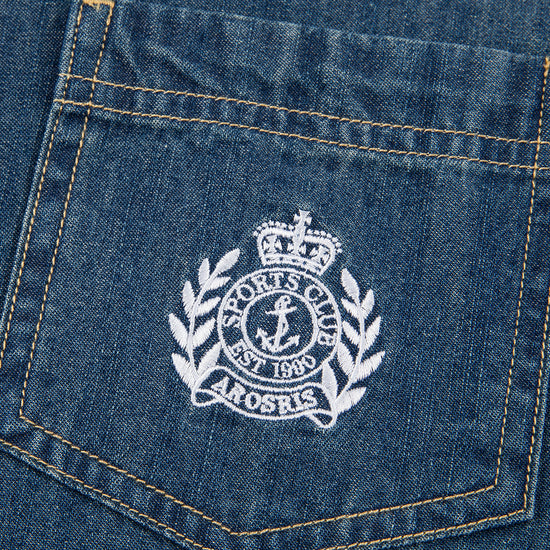 Arosris washed blue offshore crest denim shirt showcasing a classic fit, premium vintage wash, and signature nautical anchor chest pocket embroidery.