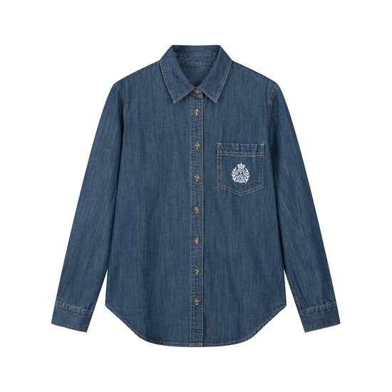 Arosris washed blue offshore crest denim shirt showcasing a classic fit, premium vintage wash, and signature nautical anchor chest pocket embroidery.