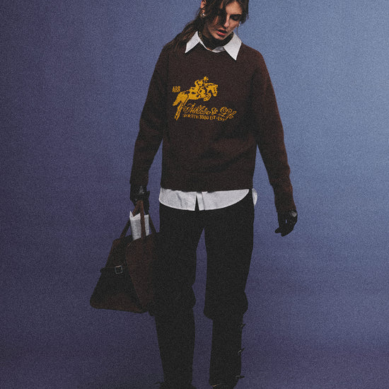 Arosris country saddle brown equestrian club cashmere sweater featuring a distinctive yellow vintage horse jacquard graphic on a premium knit texture, styled for an effortless 90s old money country estate aesthetic.