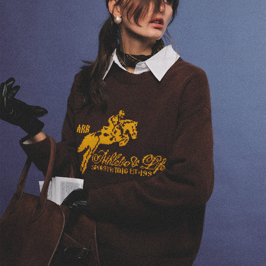 Arosris country saddle brown equestrian club cashmere sweater featuring a distinctive yellow vintage horse jacquard graphic on a premium knit texture, styled for an effortless 90s old money country estate aesthetic.