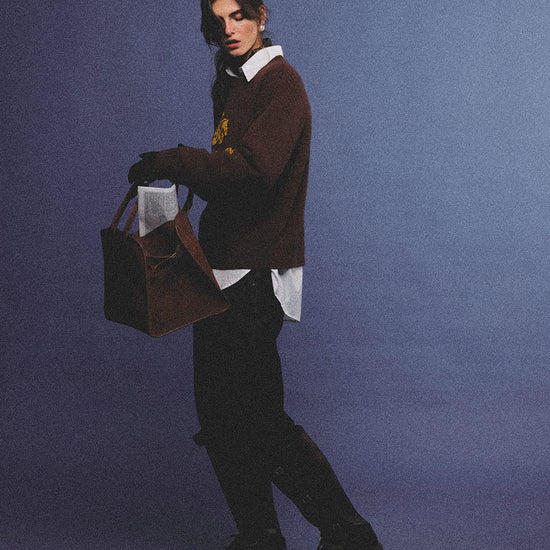 Arosris country saddle brown equestrian club cashmere sweater featuring a distinctive yellow vintage horse jacquard graphic on a premium knit texture, styled for an effortless 90s old money country estate aesthetic.