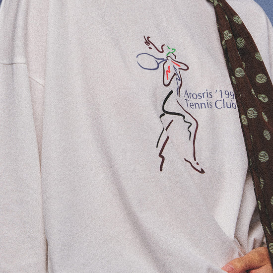 Arosris charcoal grey relaxed fit cotton t-shirt featuring a vintage 'ARR RIDING' equestrian horse graphic, styled on a model with wide-leg denim and a suede tote bag for an effortless 90s country club off-duty aesthetic.