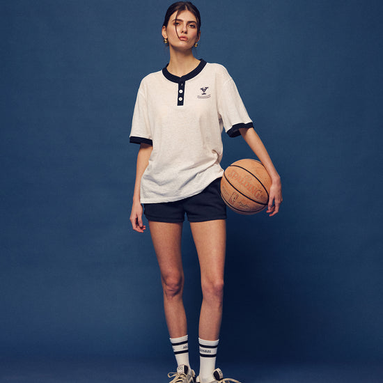 Embrace the 90s collegiate training aesthetic with the Ivy Archive Contrast Henley Tee. Featuring a classic 3-button placket, sporty ringer trims, and a comfortable relaxed fit for an effortless vintage look.